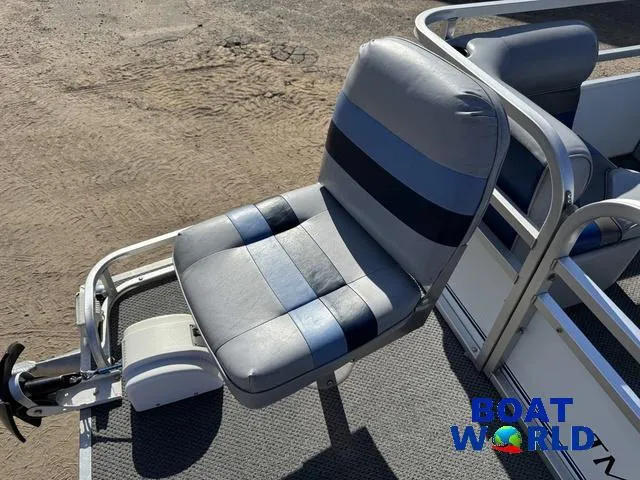 Slide: The Image of 2011 TMC 2200 SE Pontoon boat seat with blue and gray upholstery. - 10