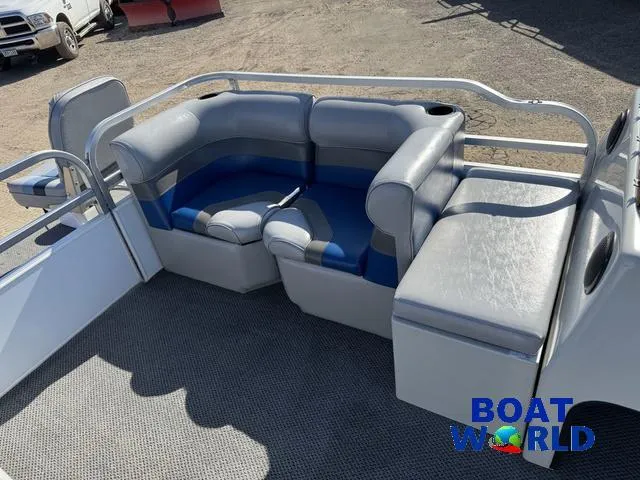 Slide: The Image of 2011 TMC 2200 SE Pontoon boat seating area with gray and blue upholstery. - 11