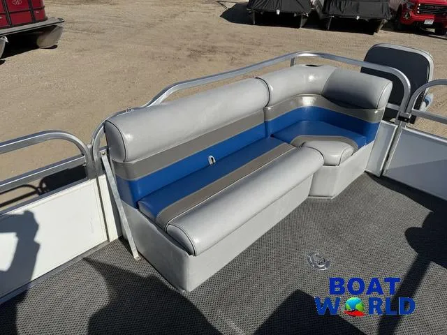 Slide: The Image of 2011 TMC 2200 SE Pontoon boat seating with gray and blue upholstery. - 16