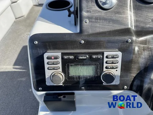 Slide: The Image of Control panel of 2011 TMC 2200 SE Pontoon with Clarion stereo system. - 23