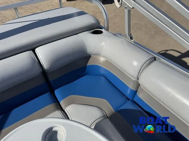 Slide: The Image of 2011 TMC 2200 SE Pontoon boat seating with blue and gray upholstery. - 34