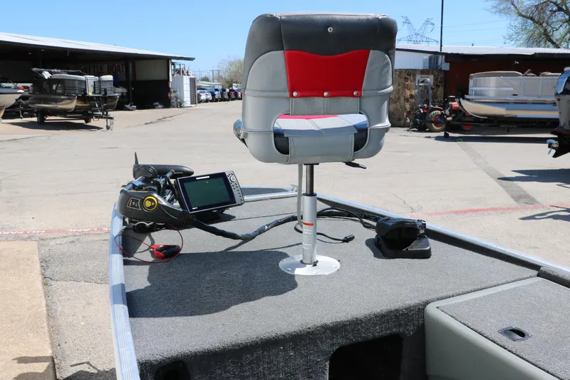 Slide: The Image of 2014 Tracker Pro 160 boat with swivel seat and navigation equipment on deck. - 12