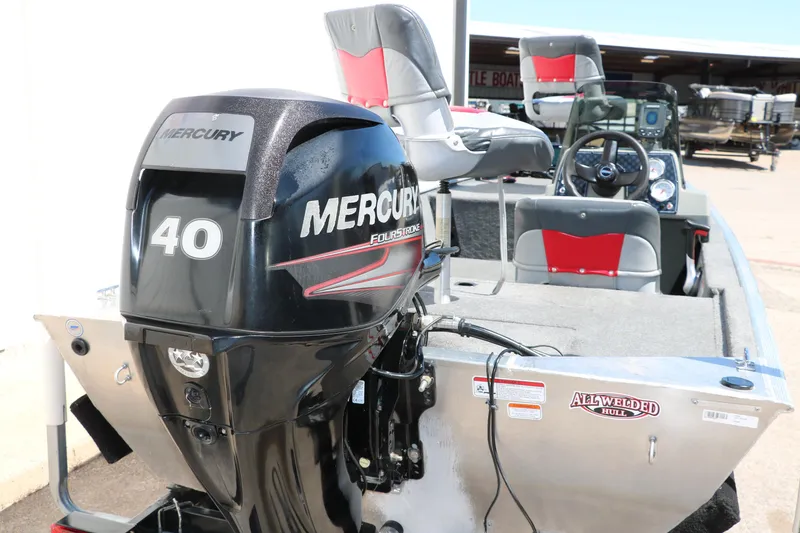 Slide: The Image of 2014 Tracker Pro 160 boat with Mercury 40 engine, featuring all-welded hull design. - 5