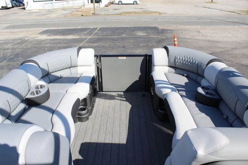 Slide: The Image of 2025 Avalon Excalibur LTD Quad Lounge 25 FT pontoon boat interior with luxurious seating. - 15