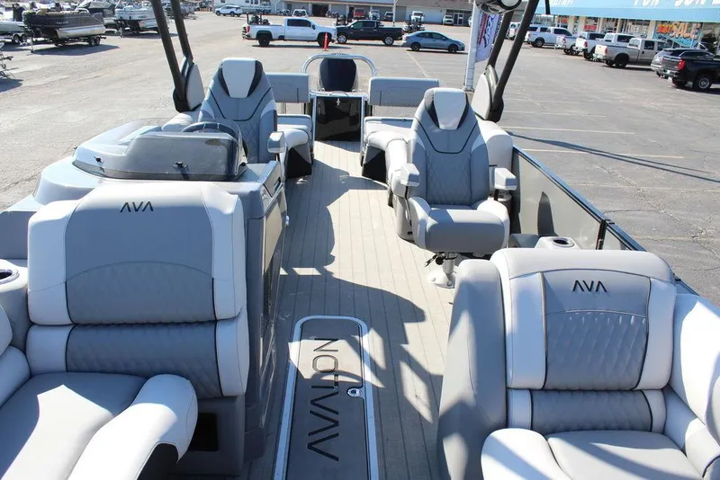 Slide: The Image of 2025 Avalon Excalibur LTD Quad Lounge 25 FT boat interior with luxurious seating. - 18