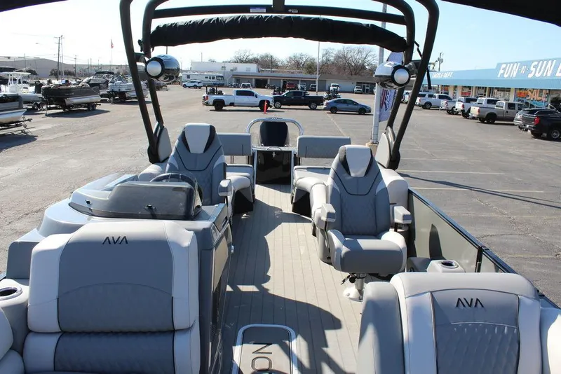 Slide: The Image of 2025 Avalon Excalibur LTD Quad Lounge 25 FT pontoon boat with luxurious seating. - 19