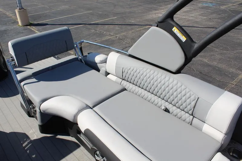 Slide: The Image of 2025 Avalon Excalibur LTD Quad Lounge 25 FT with luxurious gray seating. - 24