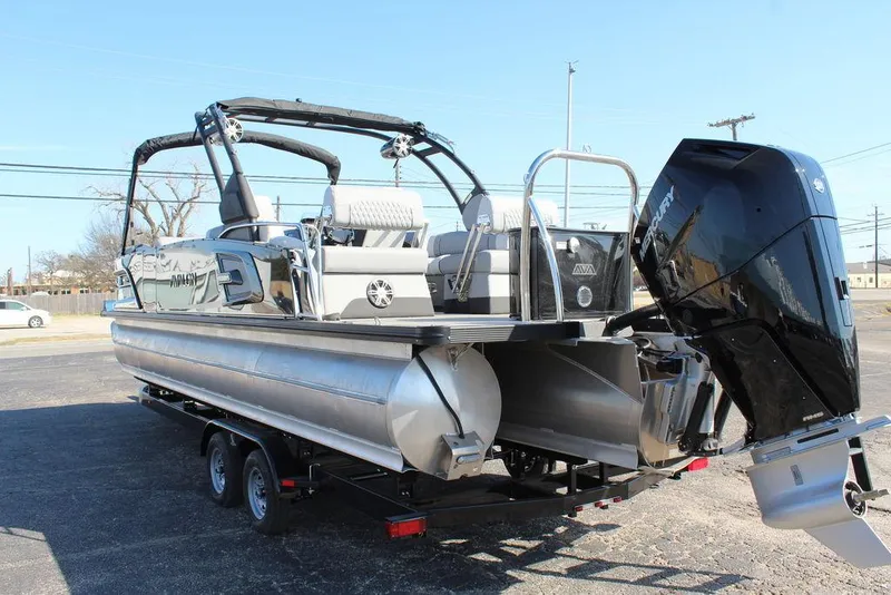 Slide: The Image of 2025 Avalon Excalibur LTD Quad Lounge 25 FT pontoon boat on trailer. - 7
