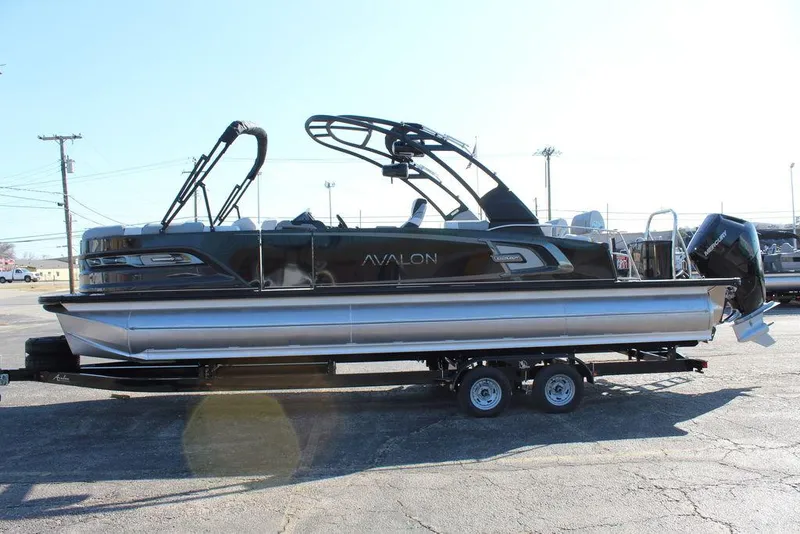 Slide: The Image of 2025 Avalon Excalibur LTD Quad Lounge 25 FT pontoon boat on trailer. - 8