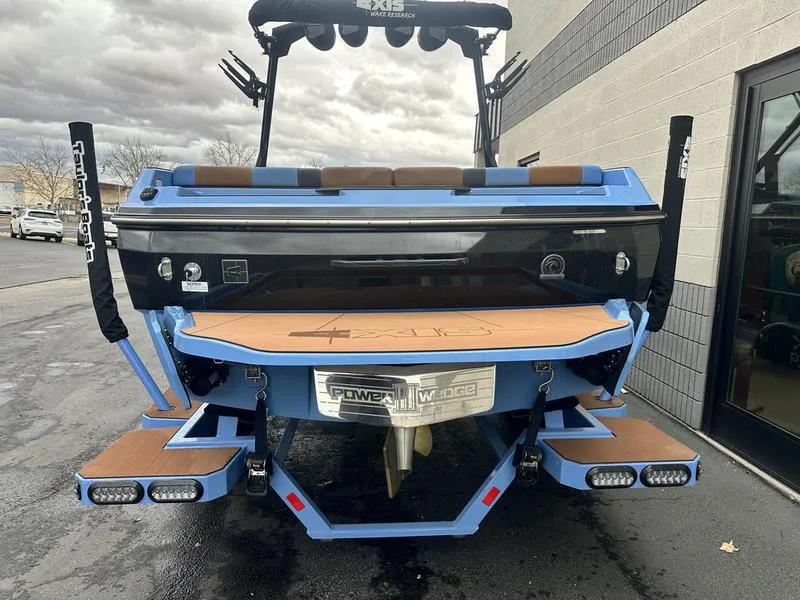 Slide: The Image of 2024 Axis A225 boat rear view with swim platform and wakeboard tower. - 5