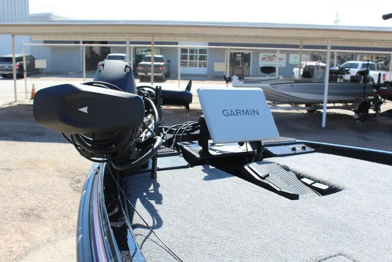 Slide: The Image of 2025 Phoenix 721 ZXL boat with Garmin navigation system on deck. - 12