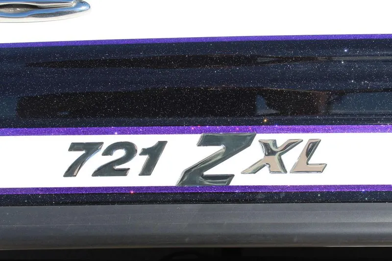 Slide: The Image of Phoenix 721 ZXL 2025 model emblem with purple and black accents. - 17