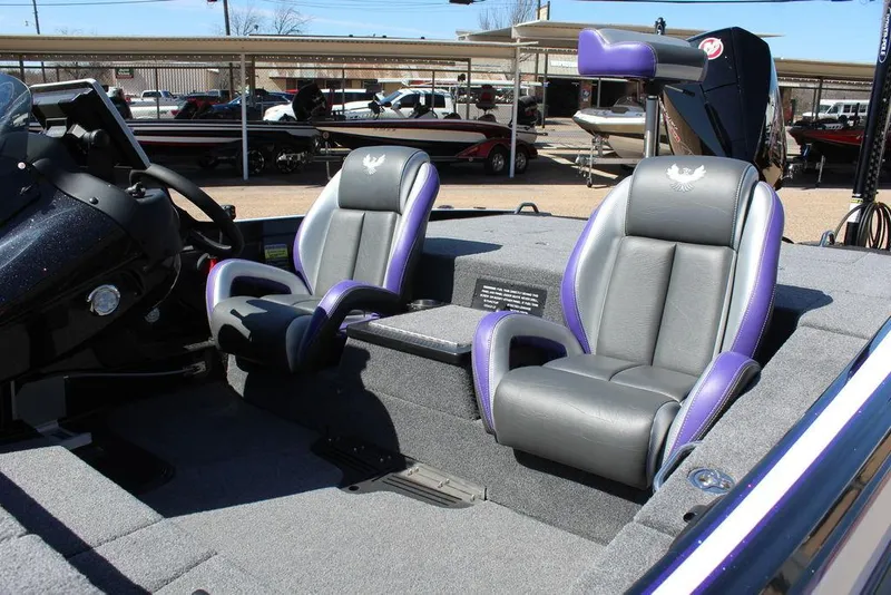 Slide: The Image of 2025 Phoenix 721 ZXL boat interior with dual gray and purple seats. - 9
