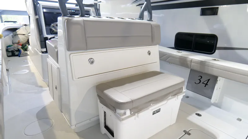 Slide: The Image of 2022 Yellowfin 34 boat interior with seating and storage. - 33