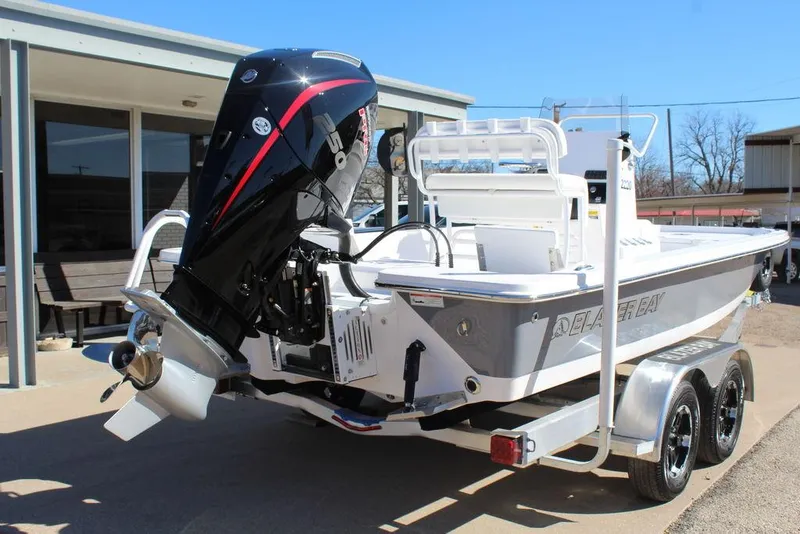 Slide: The Image of 2025 Blazer 2220 Fisherman boat on trailer, featuring powerful outboard motor. - 4