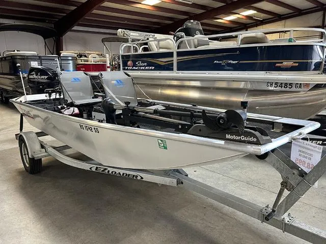 Slide: The Image of 2021 XTREME BOATS River Skiff 15452 SS on trailer in indoor showroom. - 1