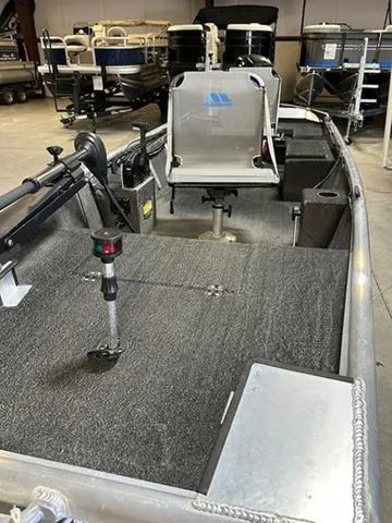 Slide: The Image of 2021 XTREME BOATS River Skiff 15452 SS, interior view, featuring seating and equipment. - 3