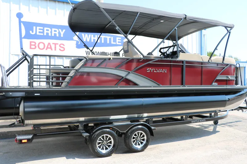 Slide: The Image of 2025 Sylvan L3 CLZ DH pontoon boat on trailer at dealership. - 15
