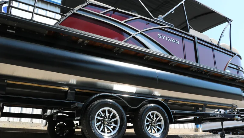 Slide: The Image of 2025 Sylvan L3 CLZ DH pontoon boat on trailer, side view. - 16