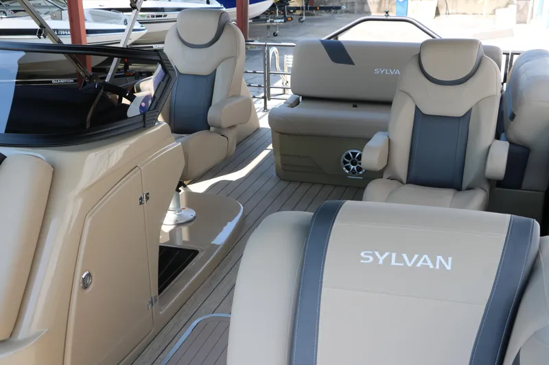 Slide: The Image of Luxurious interior of 2025 Sylvan L3 CLZ DH pontoon boat with plush seating. - 22
