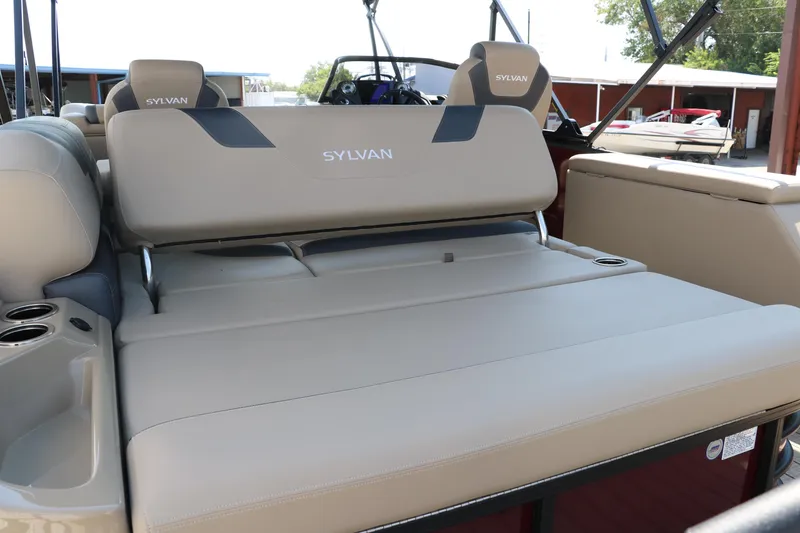 Slide: The Image of 2025 Sylvan L3 CLZ DH boat with beige seating and cup holders. - 26