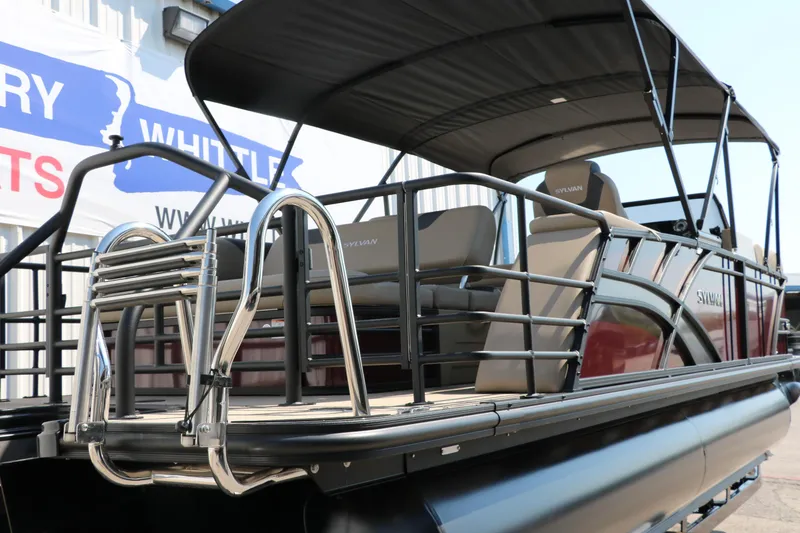 Slide: The Image of 2025 Sylvan L3 CLZ DH pontoon boat with sleek design and comfortable seating. - 3