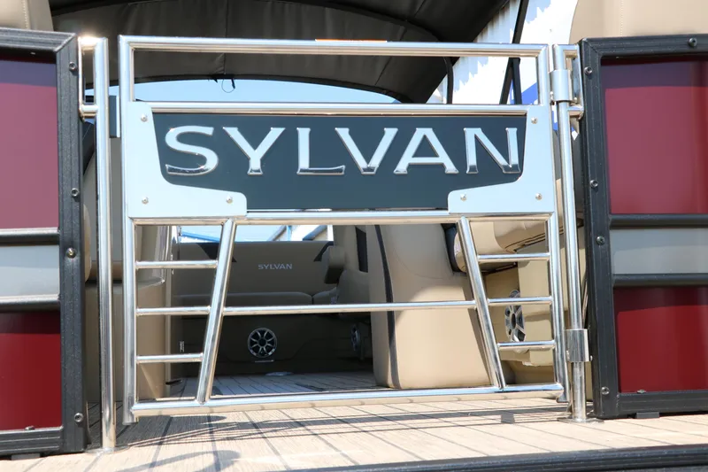 Slide: The Image of 2025 Sylvan L3 CLZ DH boat interior with branded gate and seating. - 37