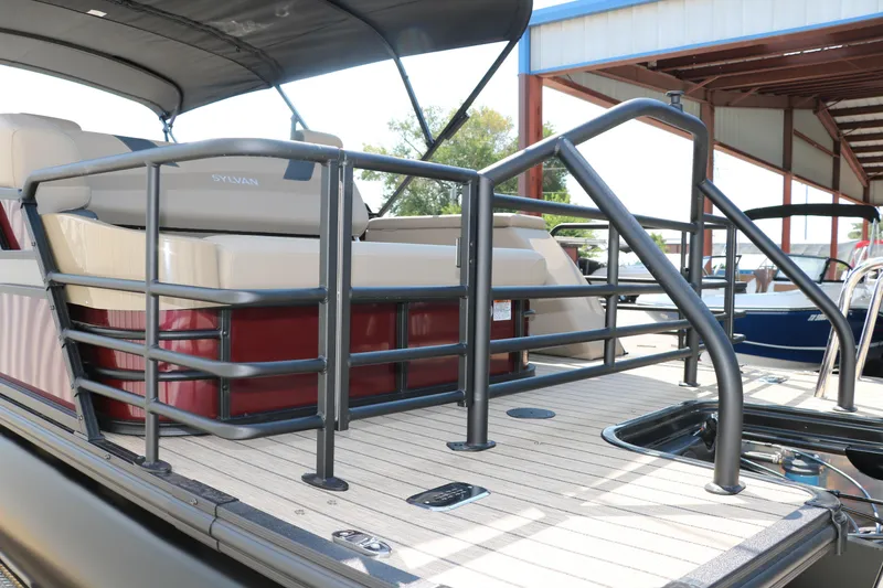 Slide: The Image of 2025 Sylvan L3 CLZ DH pontoon boat with spacious deck and seating. - 4