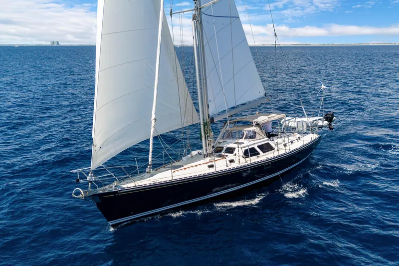 The Image of Sailing yacht Hylas 54, 2009 model, cruising on open blue sea under clear skies. - 0