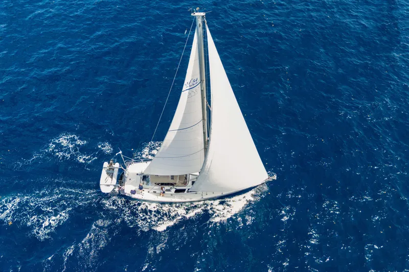 Slide: The Image of Sailing yacht Hylas 54, 2009 model, cruising on open blue sea. - 10