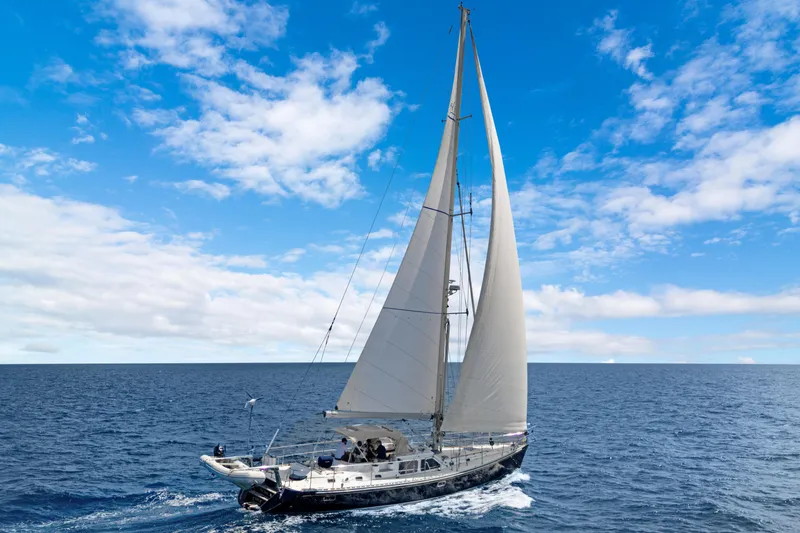 Slide: The Image of Sailing yacht Hylas 54 (2009) cruising on open sea under clear blue sky. - 12