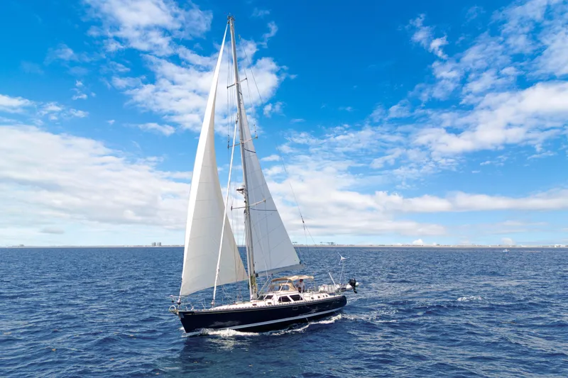 Slide: The Image of Sailing yacht Hylas 54 (2009) cruising on open sea under clear blue sky. - 14