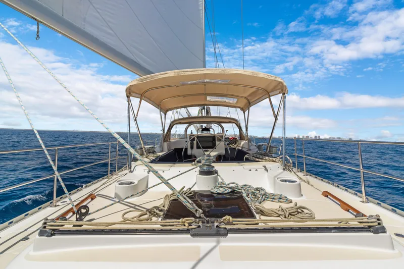 Slide: The Image of Sailing on a 2009 Hylas 54 yacht under clear blue skies. - 25