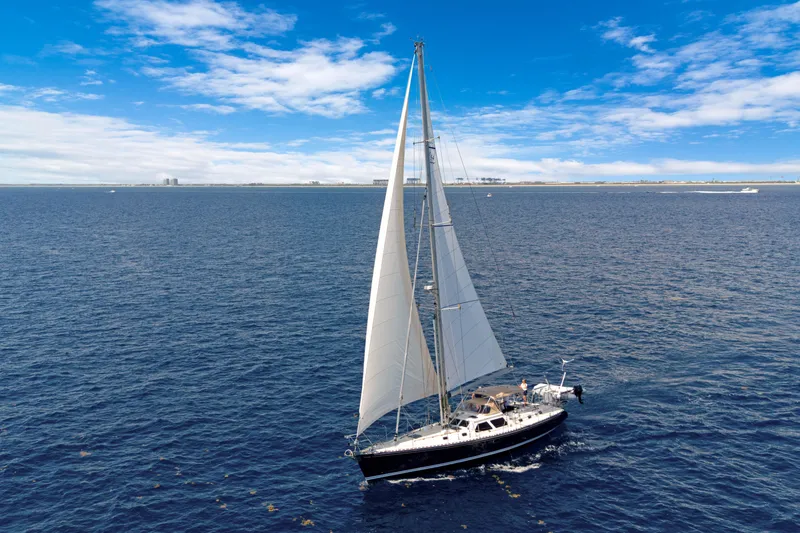 Slide: The Image of Sailing yacht Hylas 54 (2009) cruising on open sea under clear blue skies. - 3