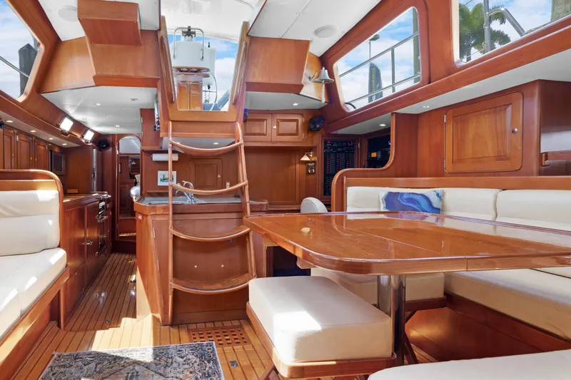Slide: The Image of Luxurious interior of 2009 Hylas 54 yacht with wooden finishes and comfortable seating. - 34