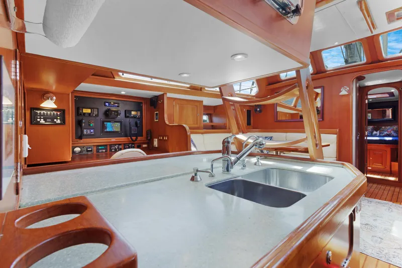 Slide: The Image of Luxurious 2009 Hylas 54 yacht interior with modern kitchen and navigation area. - 40