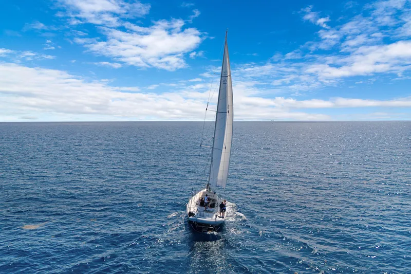 Slide: The Image of Sailing yacht Hylas 54 (2009) navigating open ocean under clear blue sky. - 6