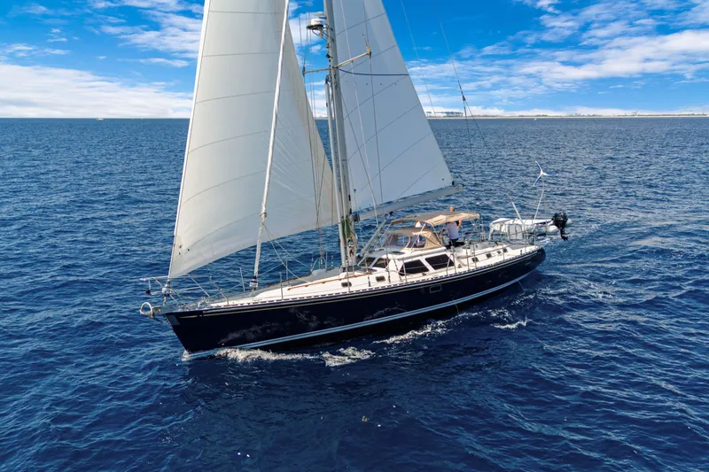 Slide: The Image of Sailing yacht Hylas 54 (2009) gliding on open ocean under clear blue skies. - 8