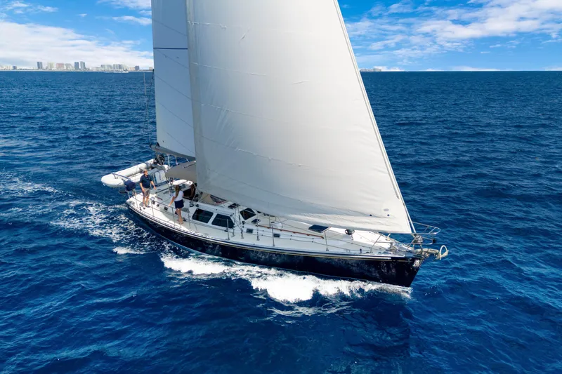 Slide: The Image of Sailing yacht Hylas 54, 2009 model, cruising on open blue ocean under clear skies. - 9