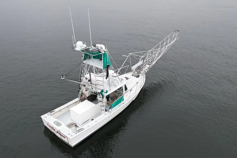 Slide: The Image of Aerial view of 2004 Beal 34 boat on calm water. - 1