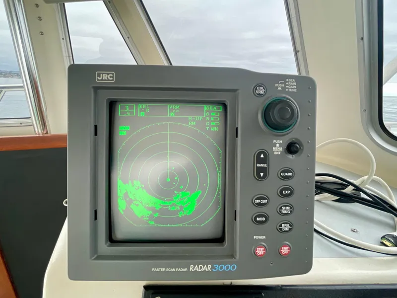 Slide: The Image of Boat radar system on a Beal 34, 2004 model, displaying navigation data. - 18