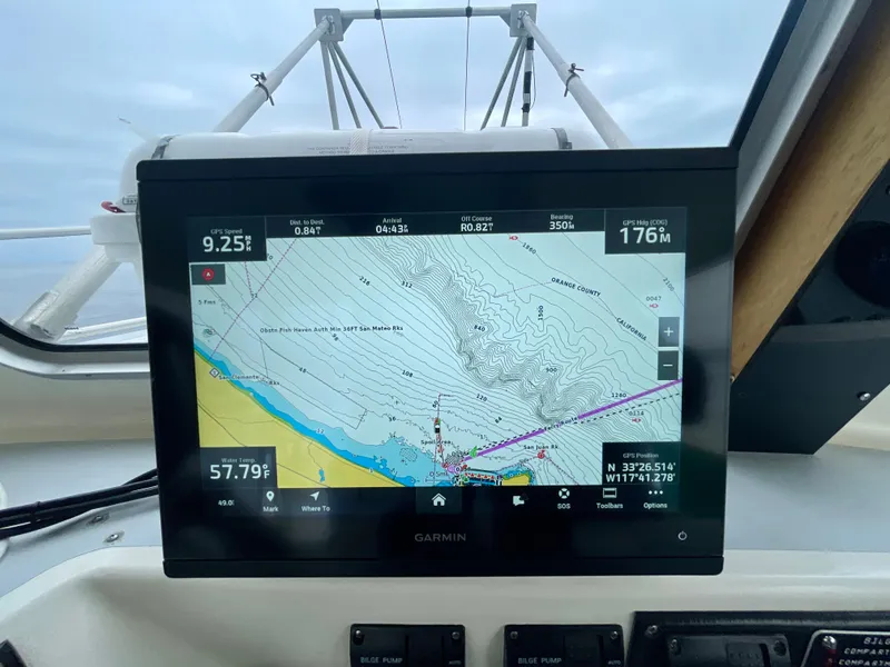 Slide: The Image of Garmin navigation display on a Beal 34 boat, showing nautical map and coordinates. - 21