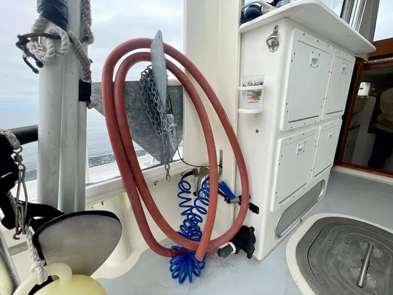 Slide: The Image of Boat deck with coiled hoses and anchor, Beal 34, 2004 model. - 32