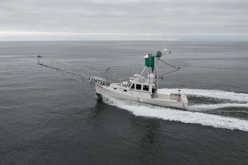Slide: The Image of Fishing boat Beal 34 cruising on open water, 2004 model. - 7