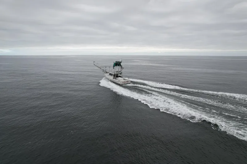 Slide: The Image of Boat cruising on open sea under cloudy sky, Beal 34 model, 2004. - 8