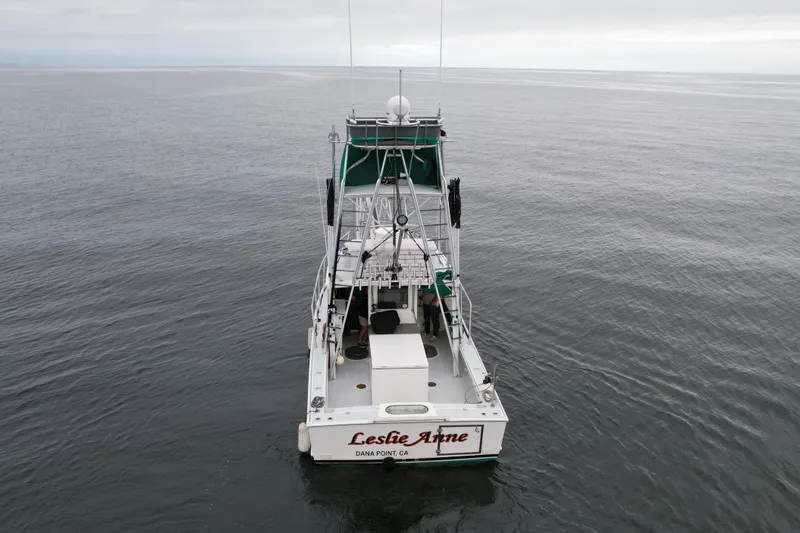 Slide: The Image of Aerial view of 2004 Beal 34 boat named "Leslie Anne" on calm ocean waters. - 9