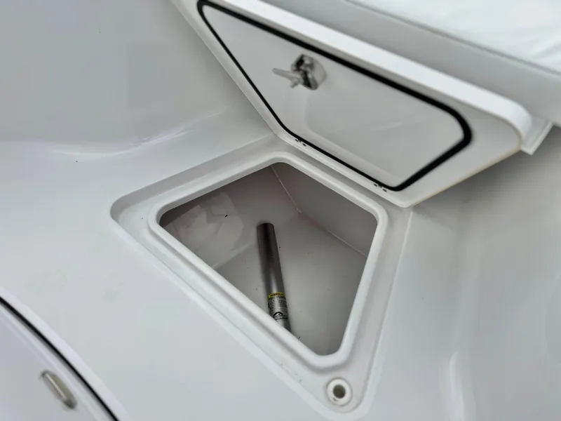 Slide: The Image of Storage compartment on 2022 Sportsman Heritage 241 Center Console boat. - 12