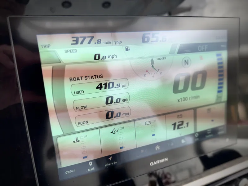 Slide: The Image of Display screen on 2022 Sportsman Heritage 241 Center Console showing trip and boat status. - 27