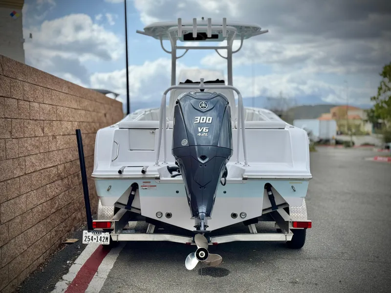 Slide: The Image of 2022 Sportsman Heritage 241 Center Console boat with Yamaha 300 V6 engine on trailer. - 4