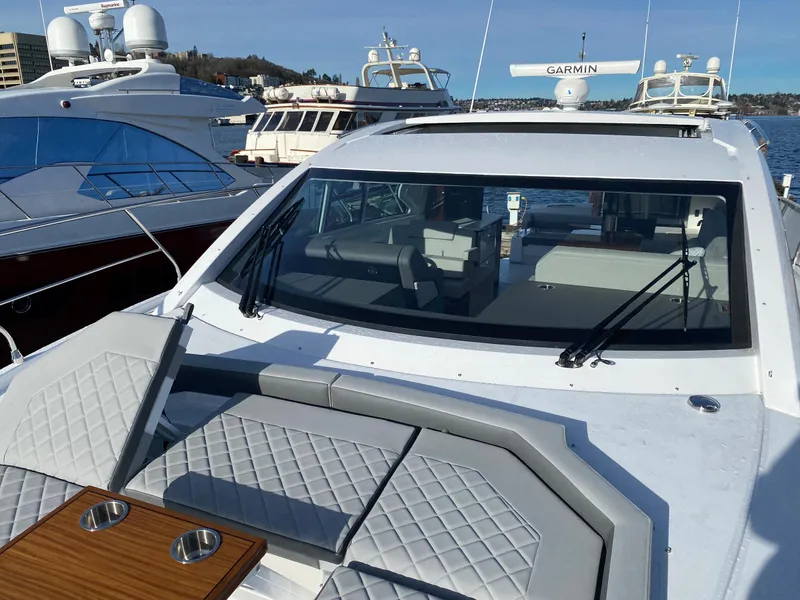 Slide: The Image of 2023 Cruisers Yachts 46 Cantius luxury boat docked with sleek design and modern features. - 15